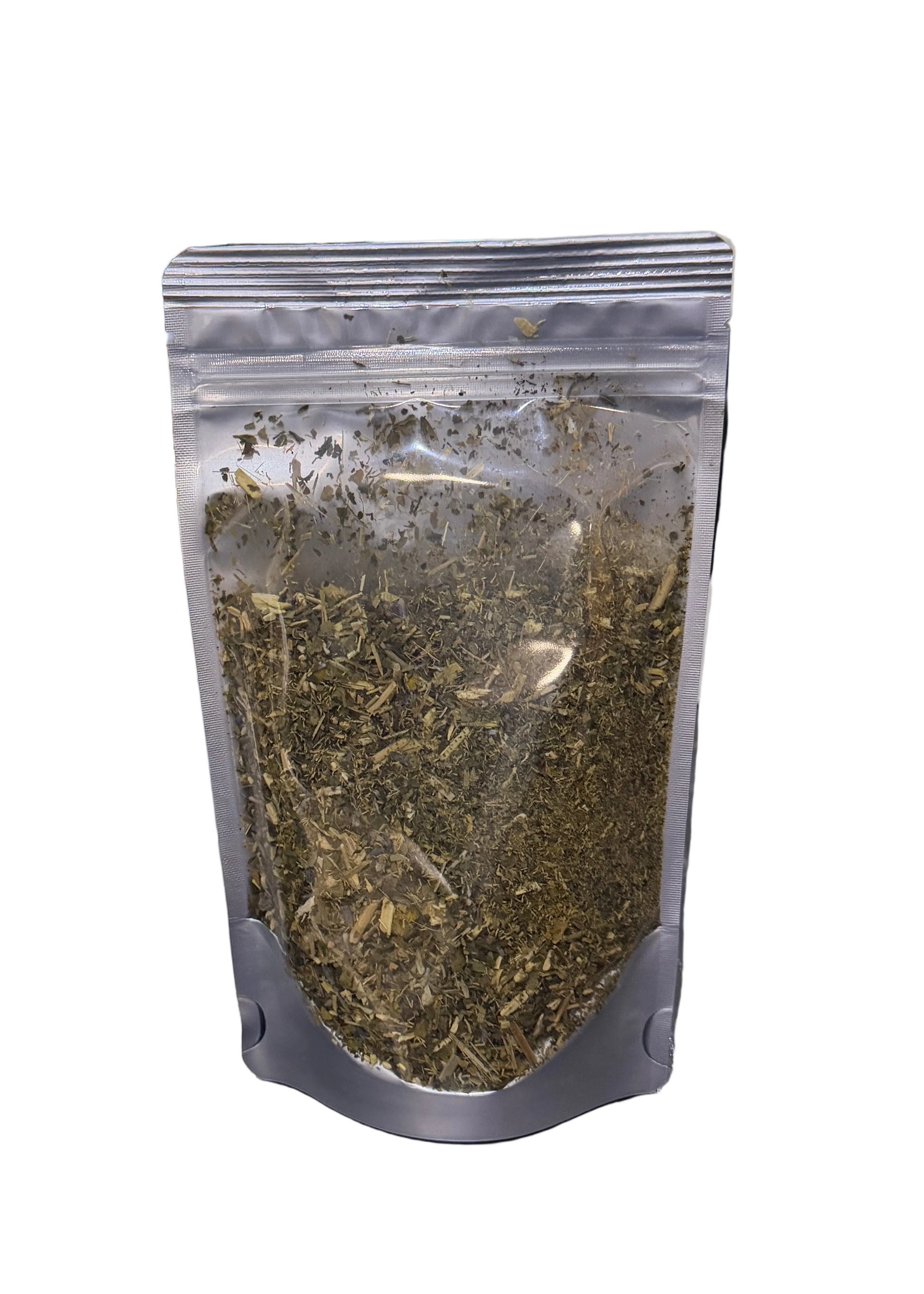 Clear plastic bag with green leafy contents on a white background